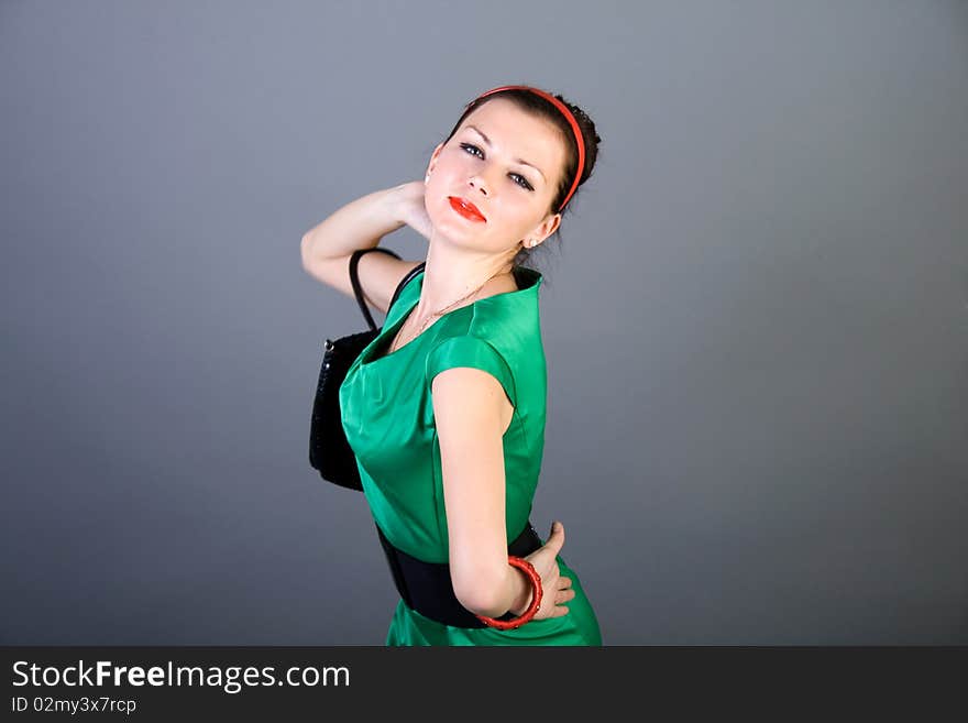 Pretty pinup girl posing in studio