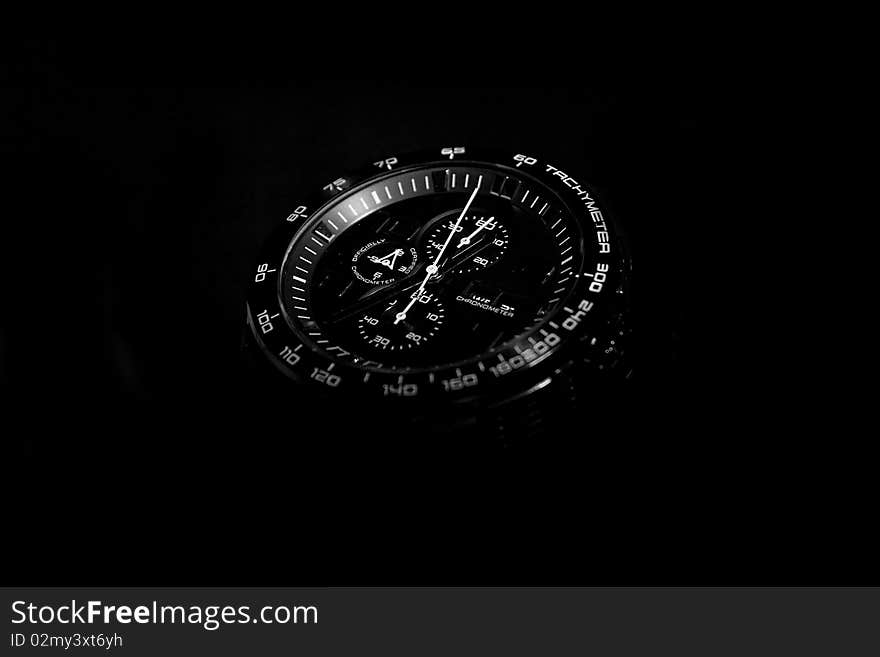 Expensive black watch in the dark. Expensive black watch in the dark