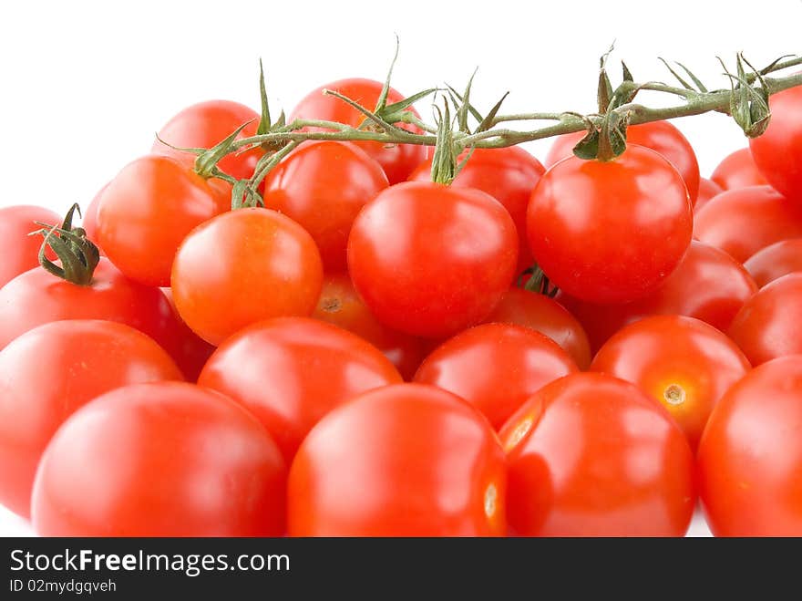 Shiny Cherry tomatoes with branch