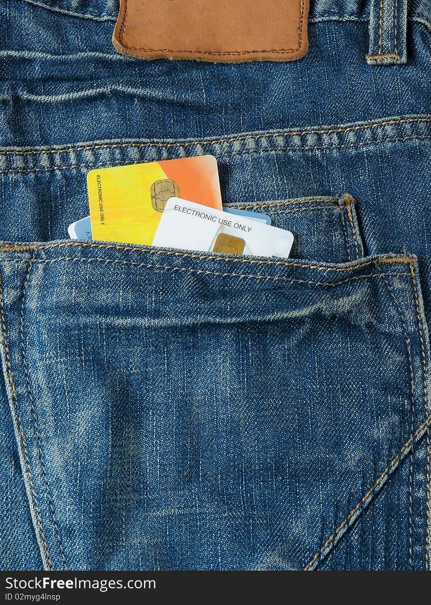 Credit card and blue jeans pocket. Credit card and blue jeans pocket