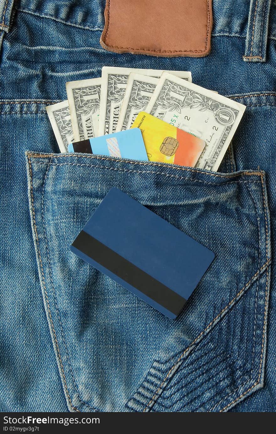 Money with credit cards in jeans pocket. Money with credit cards in jeans pocket