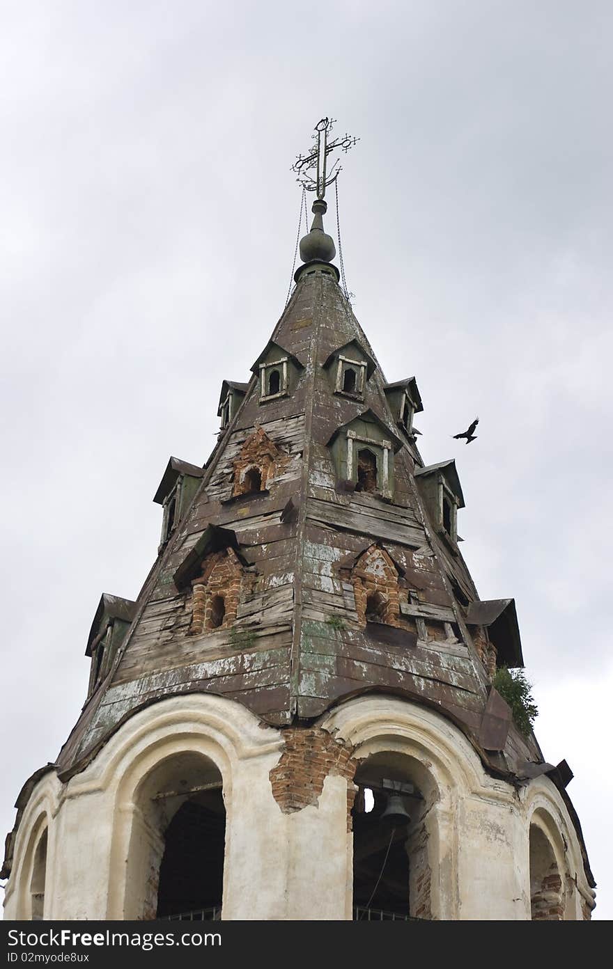 Old christianity bell tower in a small russian village