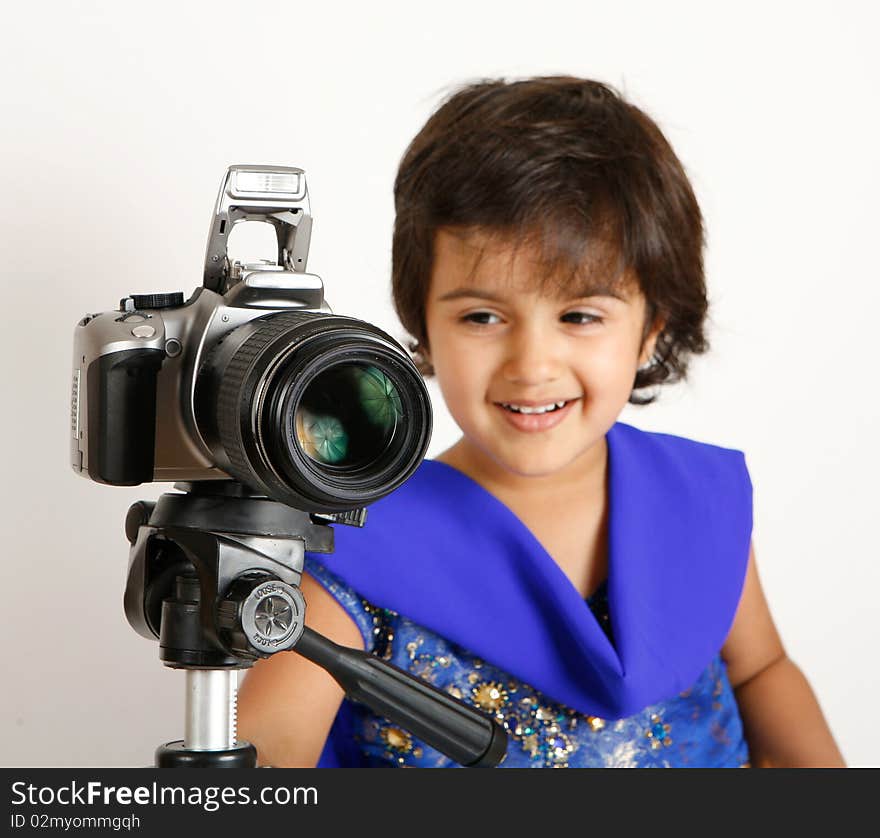 Toddler playing with camera