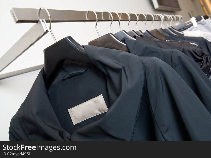 Clothes on racks in store