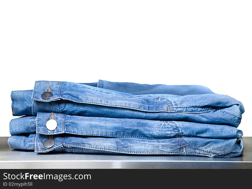 Blue Jeans In Store Isolated On White