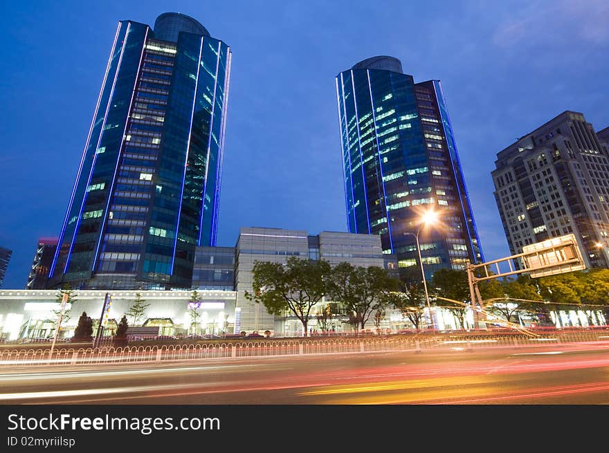 Skyscrapers - office buildings in downtown Beijing at night time