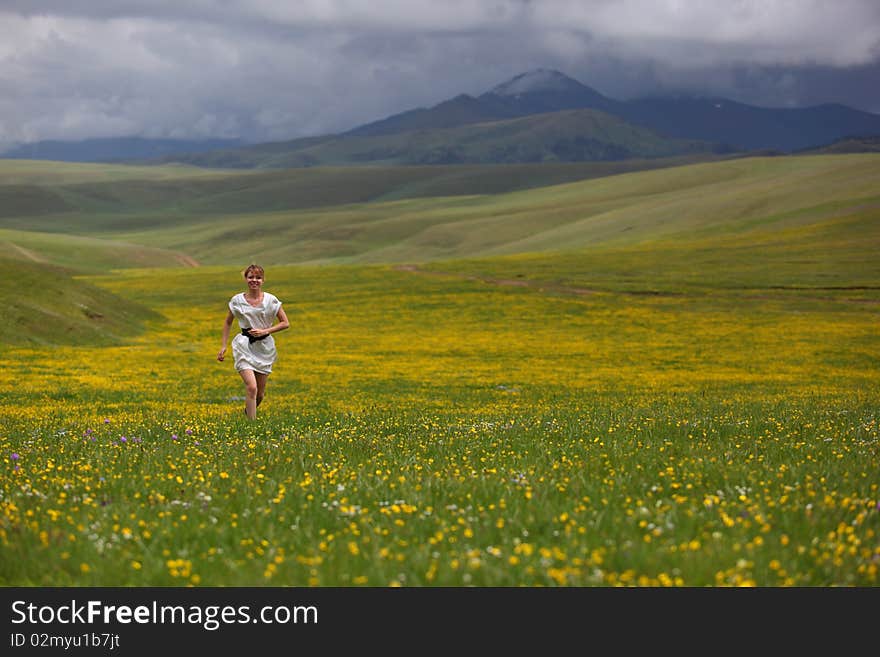 Beautiful mountain landscape with the girl. Beautiful mountain landscape with the girl