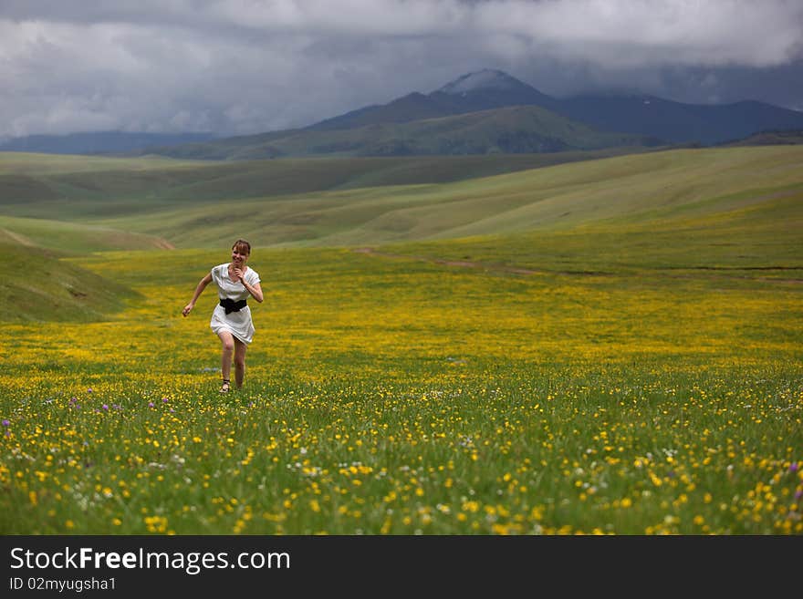 Beautiful mountain landscape with the girl. Beautiful mountain landscape with the girl