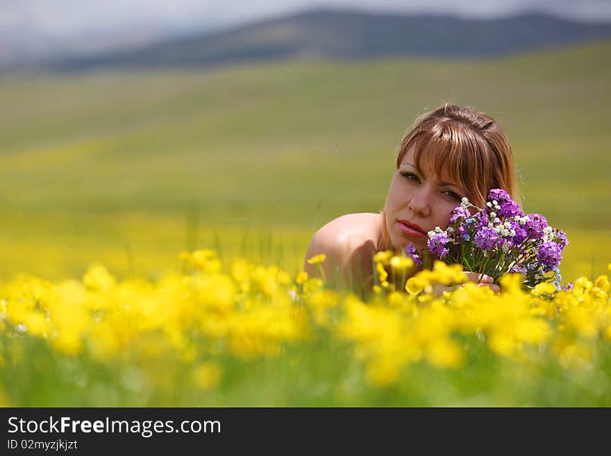 The girl with a bunch of flowers