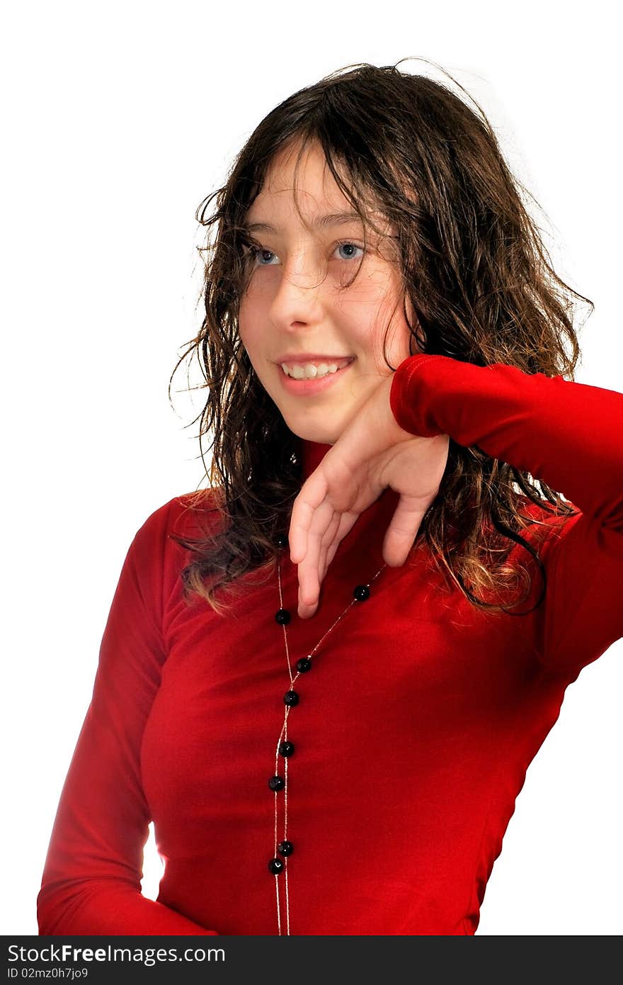 Girl with wet hair, red clothes, rested his head with his hand. She smiles and friendly looking. She looks sideways. Isolated