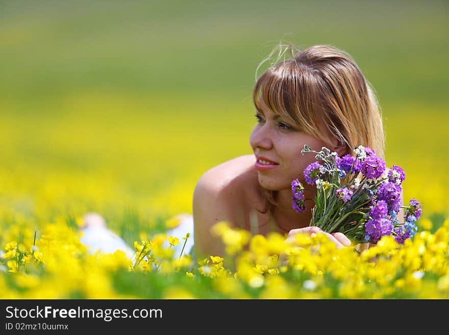 The girl with a bunch of flowers