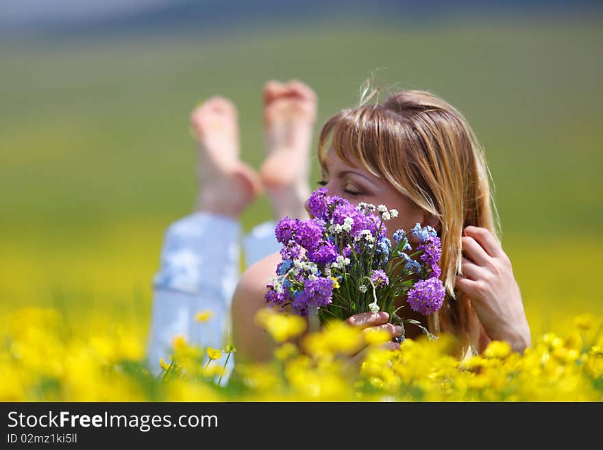 The girl with a bunch of flowers