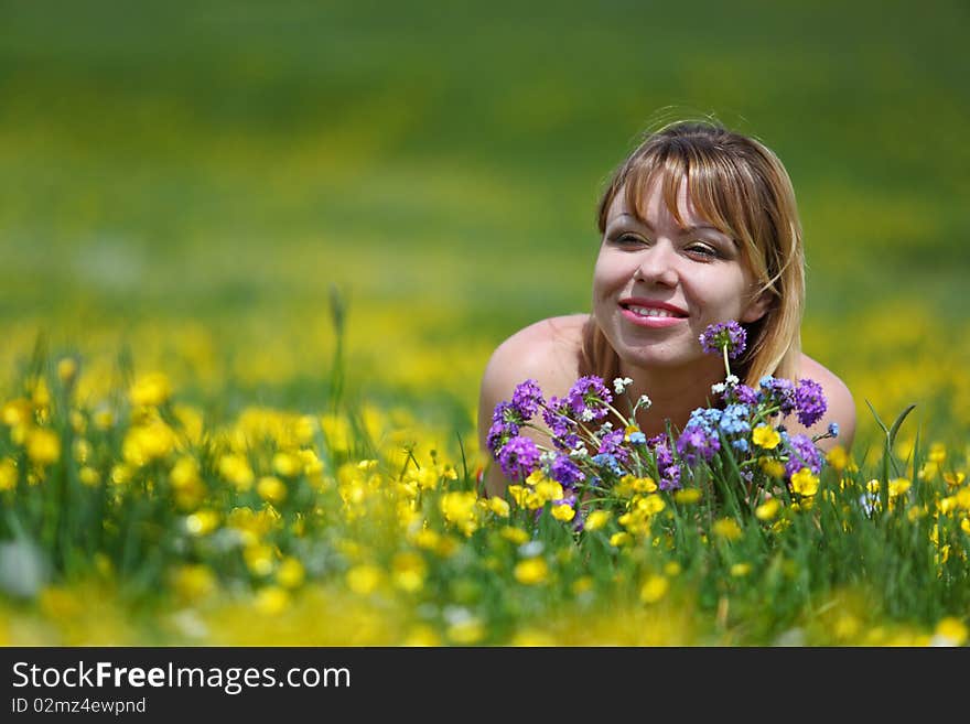 The girl with a bunch of flowers