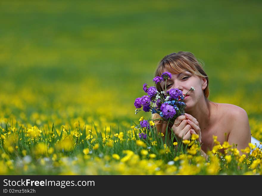 The girl with a bunch of flowers