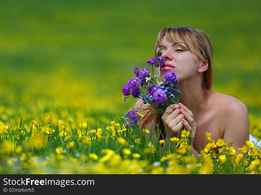 The girl with a bunch of flowers