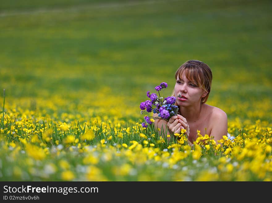 The girl with a bunch of flowers