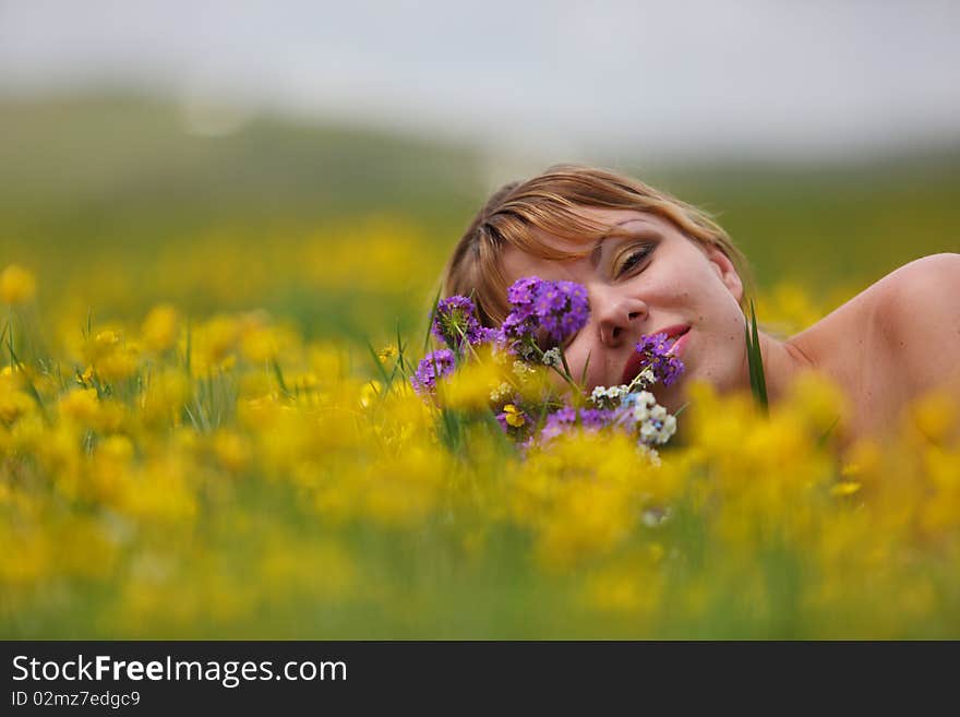 The girl with a bunch of flowers