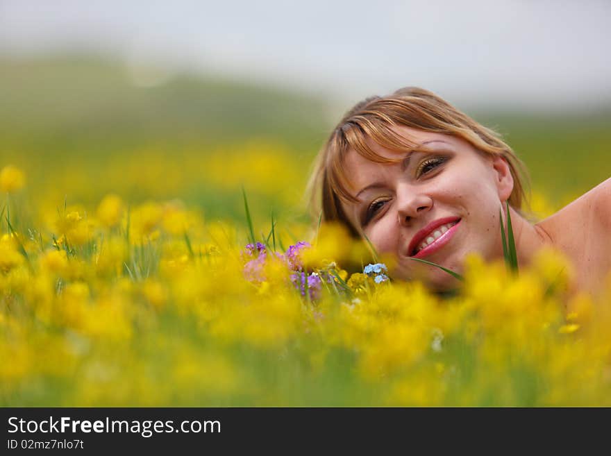 The girl with a bunch of flowers