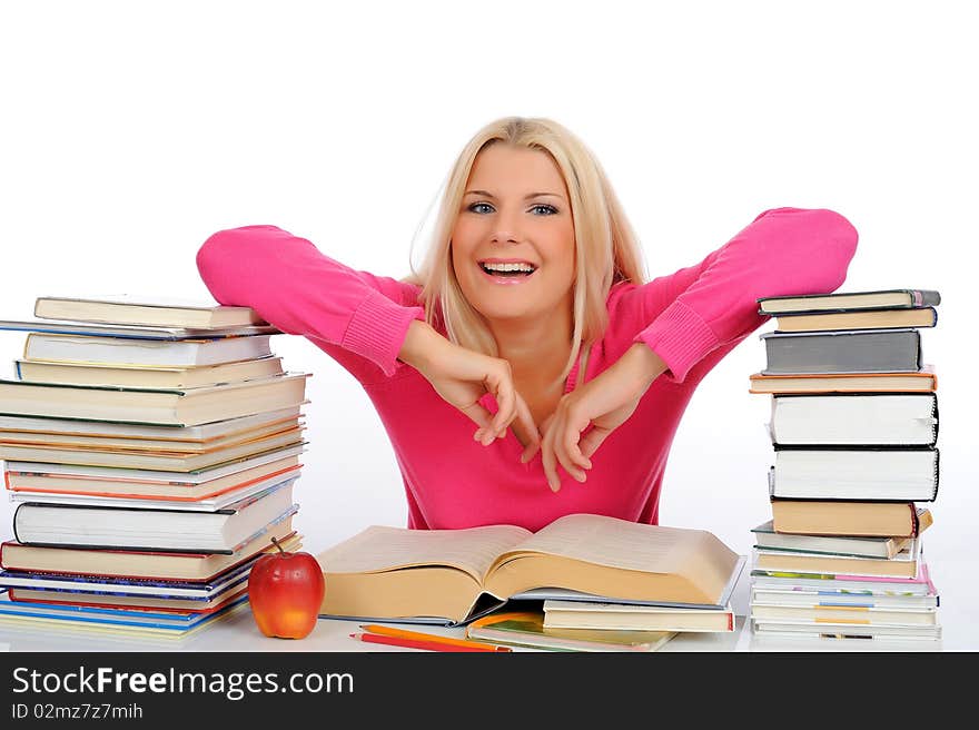 Young student girl with lots of books