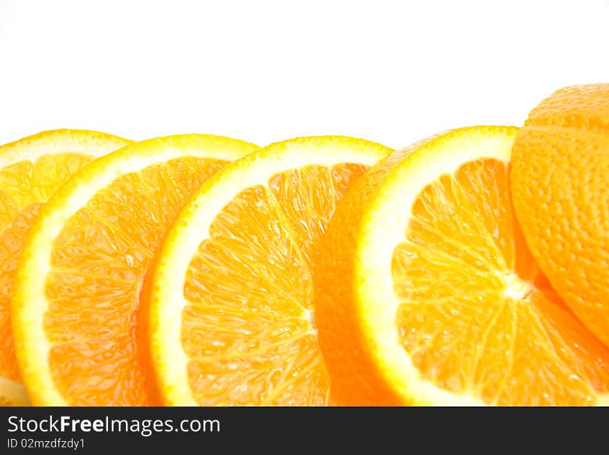 Close-up tasty slice orange on white background. Close-up tasty slice orange on white background