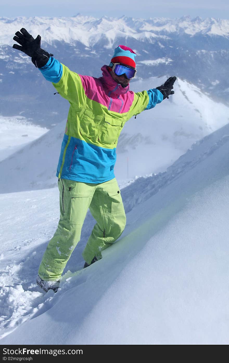 Snowboarder on the top of the mountain