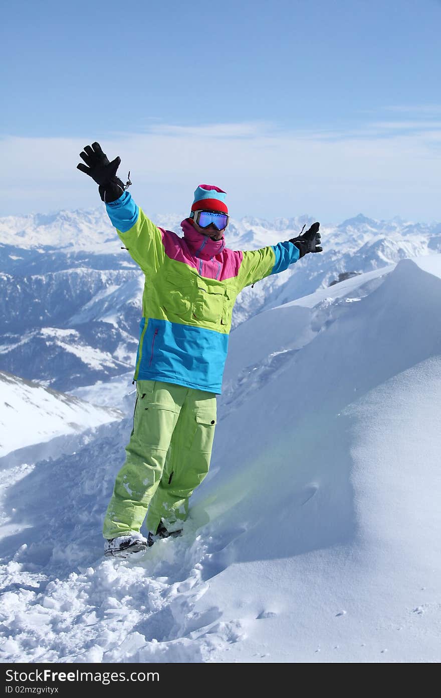 Snowboarder on top of the mountain