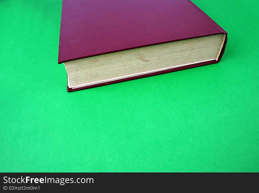 Red book, isolated on Green