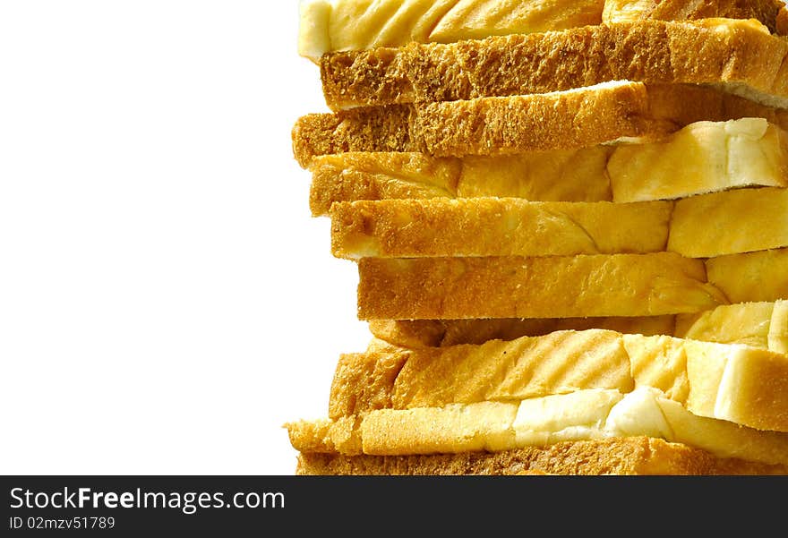 Pieces of bread on white background