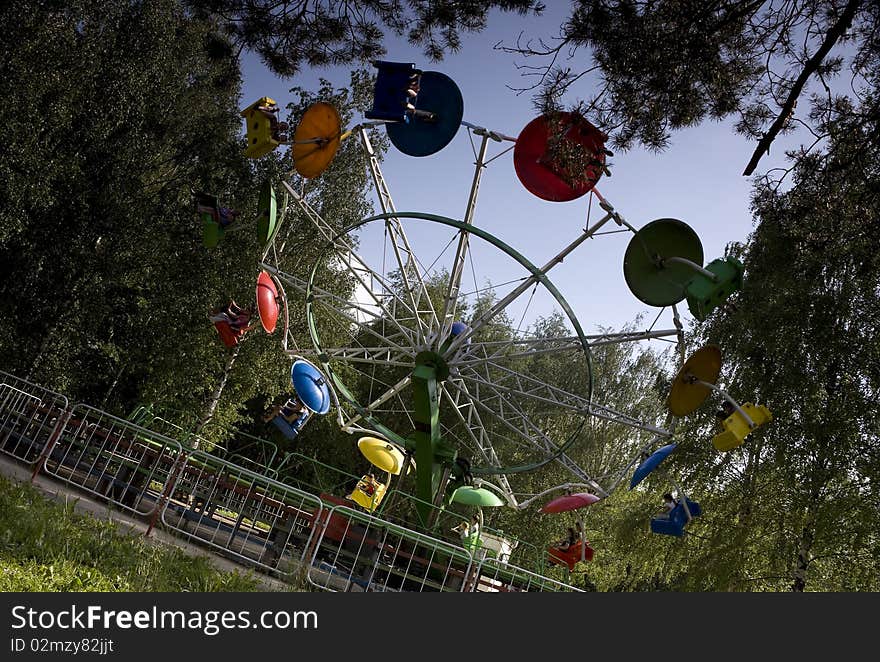 Carousel rotation in park amusement