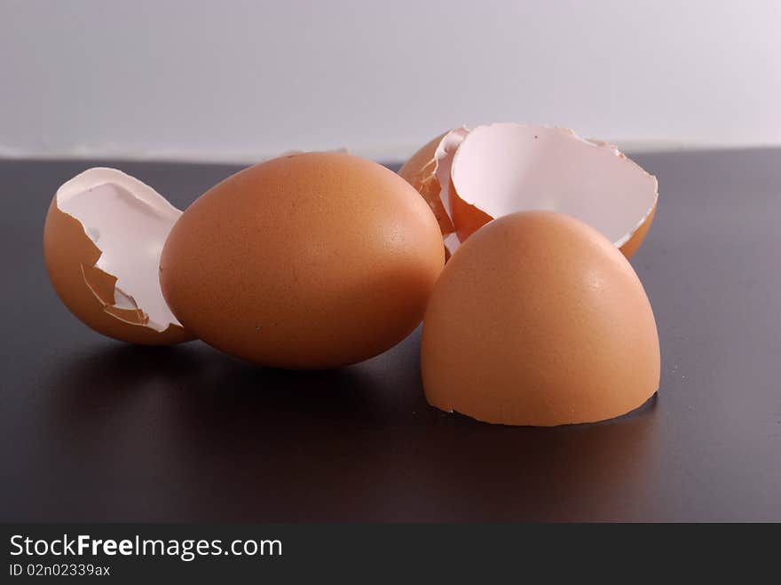 Broken egg shell isolated on black background