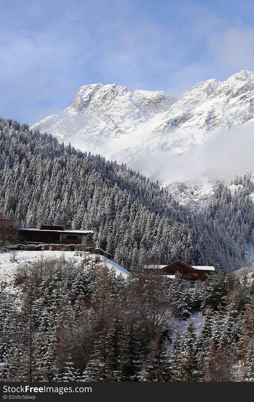 House in snow mountain