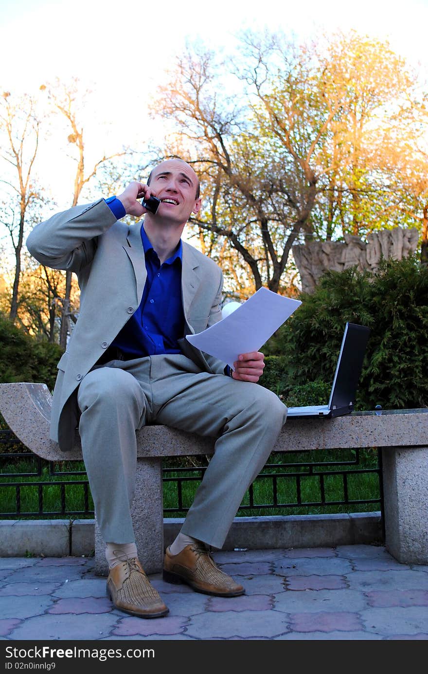 Businessmen is working with his computer