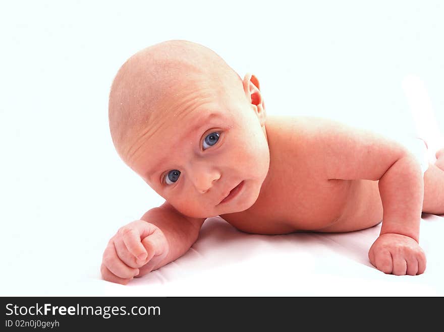 The small newborn child on a white background