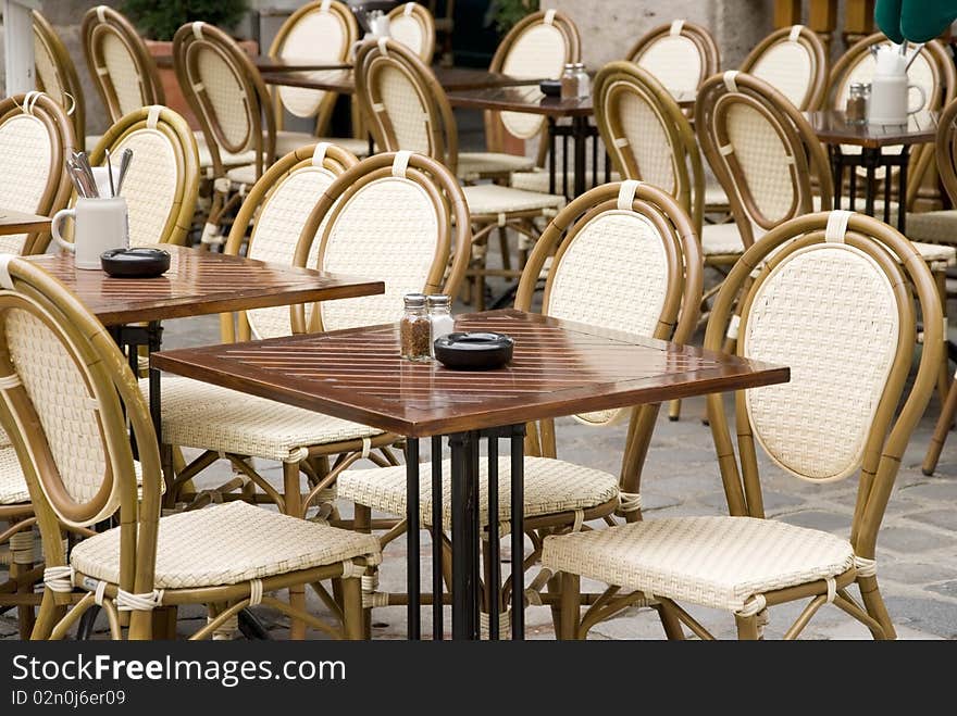 Typical munich stgreet cafe with wicker chairs. Typical munich stgreet cafe with wicker chairs