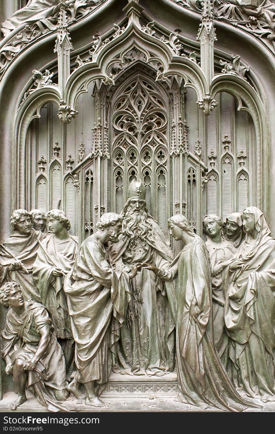 Bronze low relief of Milan Cathedral main door