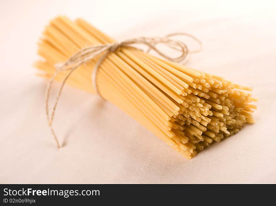 Italian long spaghetti pasta over white