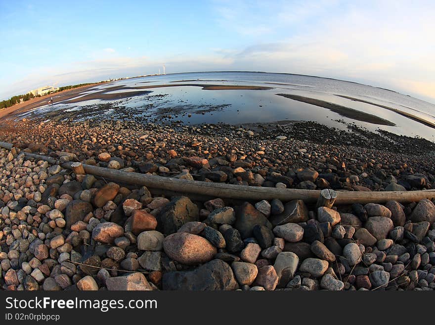 Sunset on the sea shore, fisheye distortion