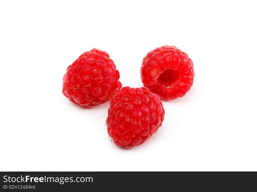 Berries red raspberries on an isolated background