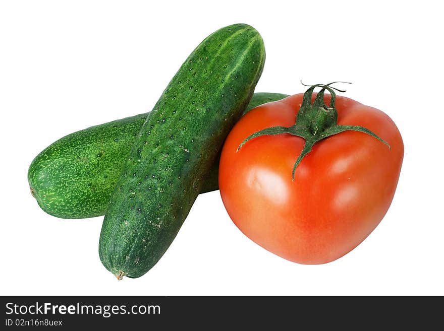 Vegetables - cucumbers and tomato it is isolated on white background