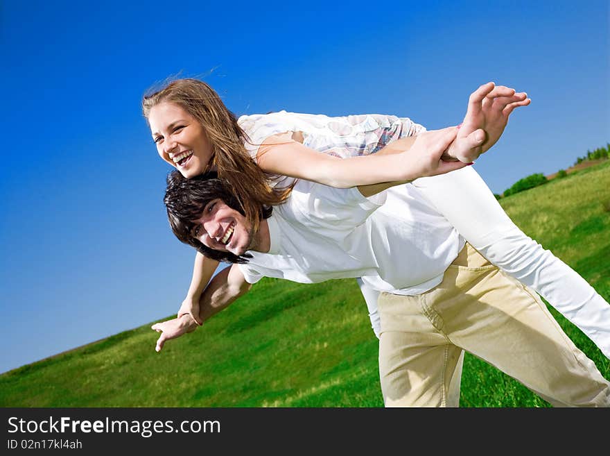 Long-haired girl and boy with smile