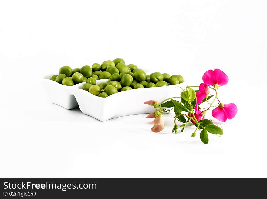 Green peas on a white background