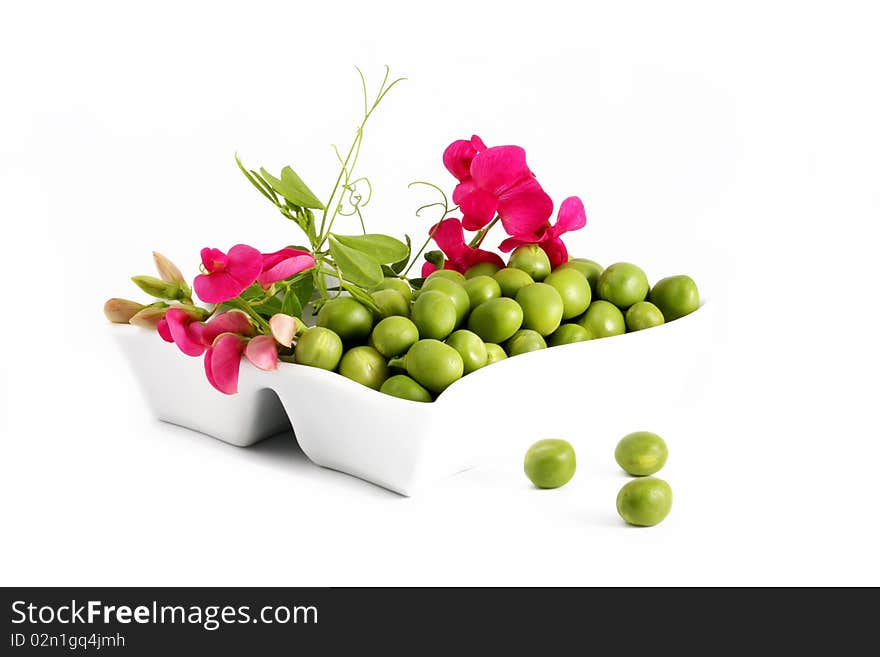 Green peas on a white background