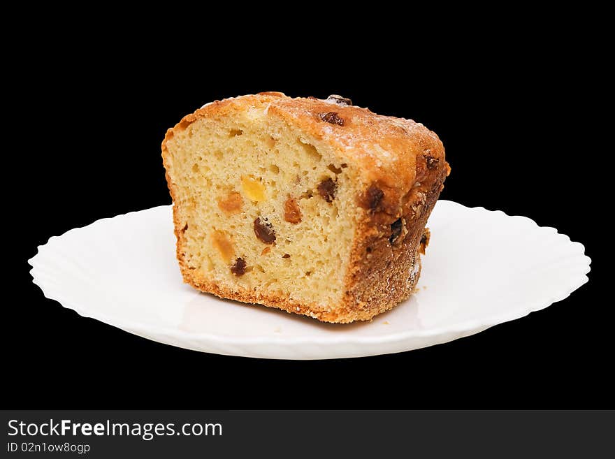 Fruitcake on white plate