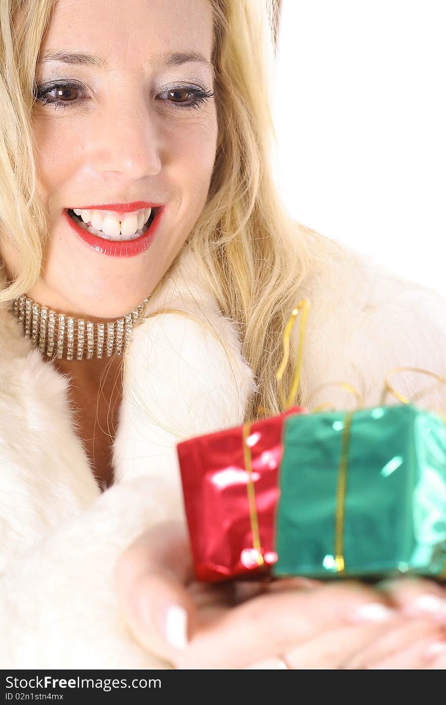 Happy blonde holding presents vertical upclose