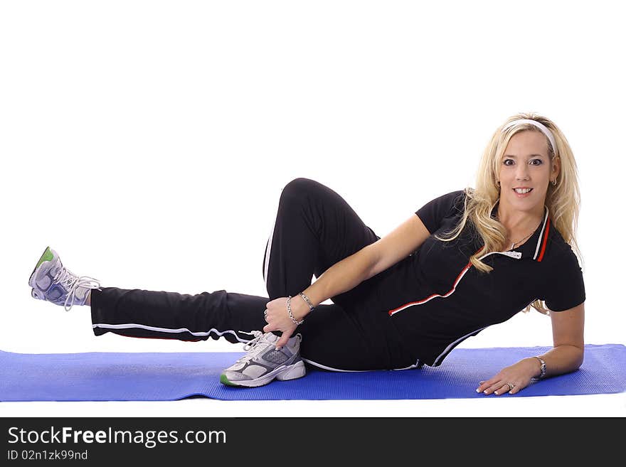 Blonde working out leg lifts