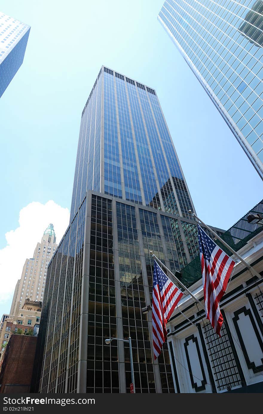 Skyscrapers and american flags of New York