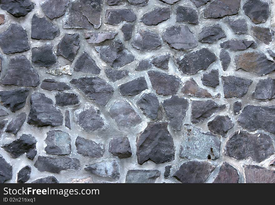 Stone wall closeup photography usable as background