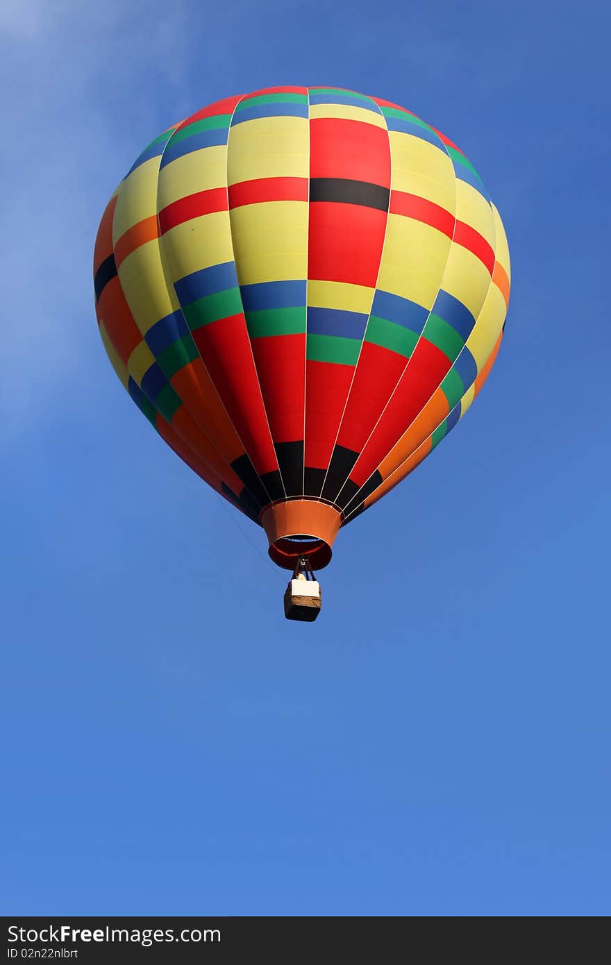 Colorful hot air balloon with blue sky background. Colorful hot air balloon with blue sky background