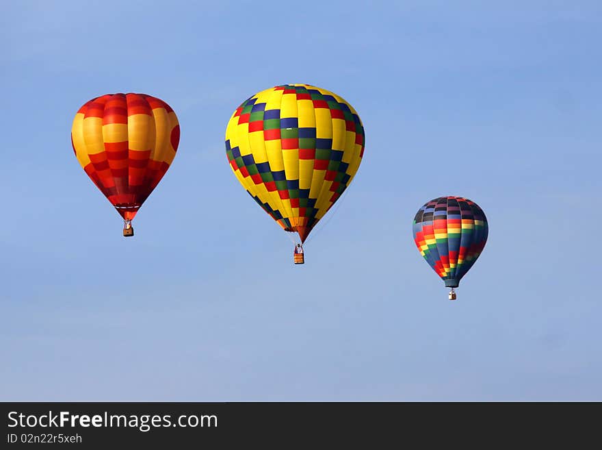 Colorful hot air balloon with blue sky background. Colorful hot air balloon with blue sky background