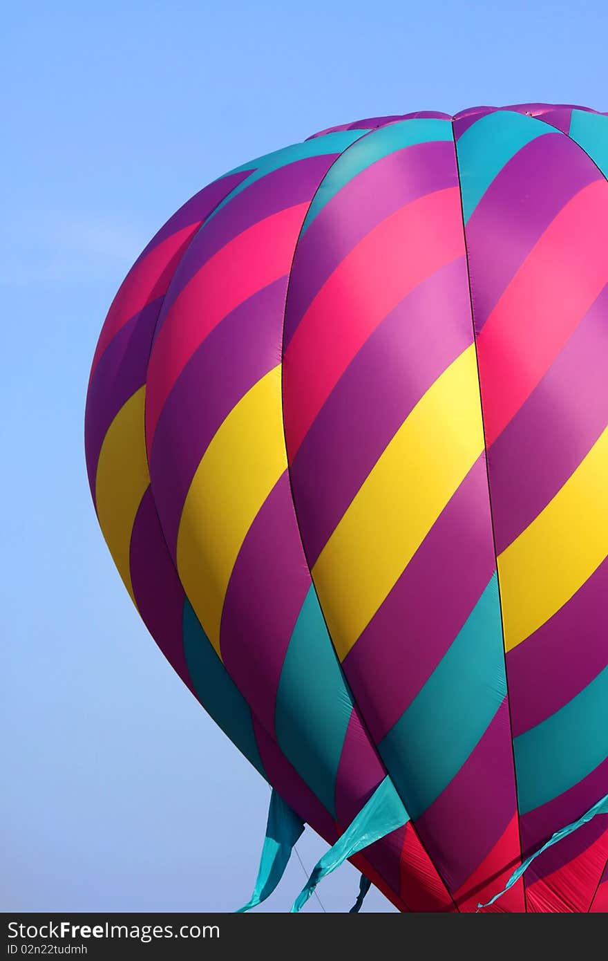 Colorful hot air balloon with blue sky background. Colorful hot air balloon with blue sky background